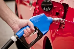 depositphotos-72421213-stock-photo-man-using-blue-gasoline-nozzle.jpg